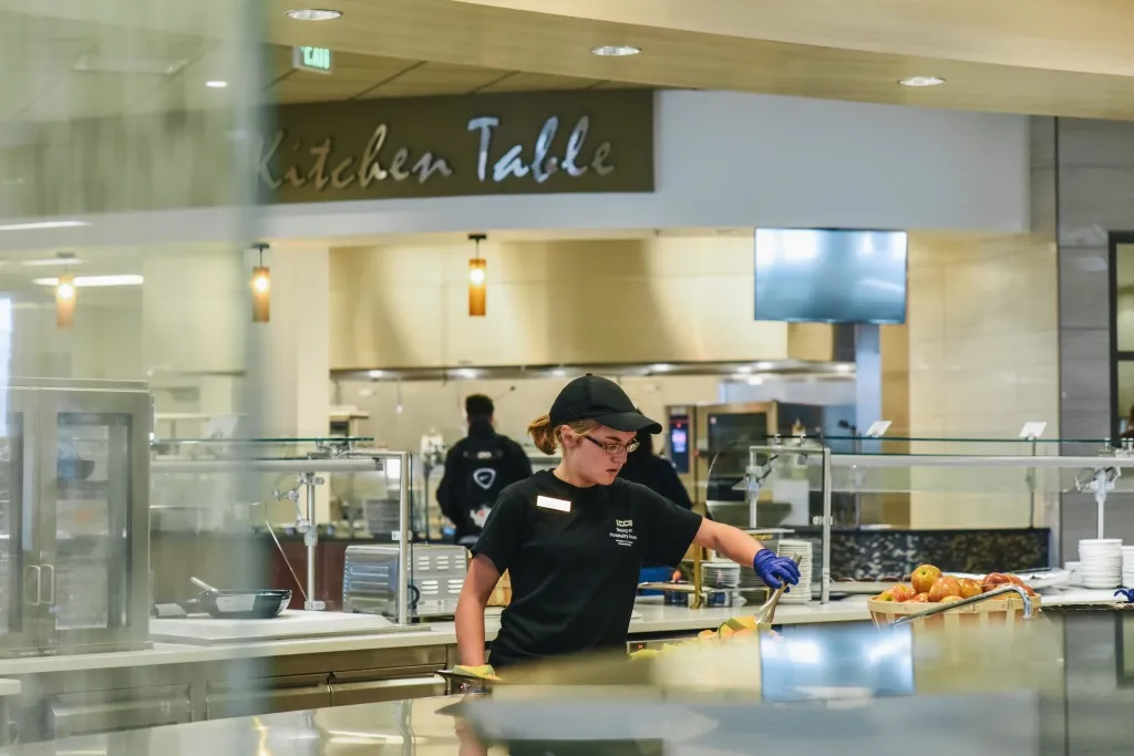 Student employee working in the dining hall